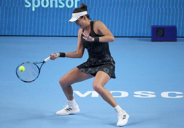 MOSCOW, RUSSIA - OCTOBER 20, 2021: Spain s Garbine Muguruza returns the ball in her women s singles Round of 16 tennis match against the Czech Republic s Tereza Martincova at the VTB Kremlin Cup 2021 at the Luzhniki Sports Palace. Mikhail Tereshchenko TASS  TS114D77