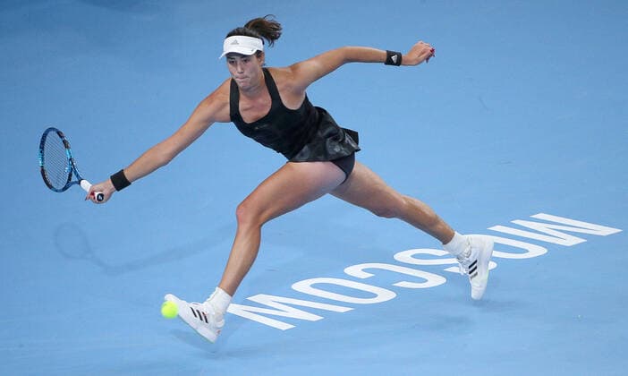 MOSCOW, RUSSIA - OCTOBER 20, 2021: Spain s Garbine Muguruza returns the ball in her women s singles Round of 16 tennis match against the Czech Republic s Tereza Martincova at the VTB Kremlin Cup 2021 at the Luzhniki Sports Palace. Mikhail Tereshchenko TASS  TS114D90