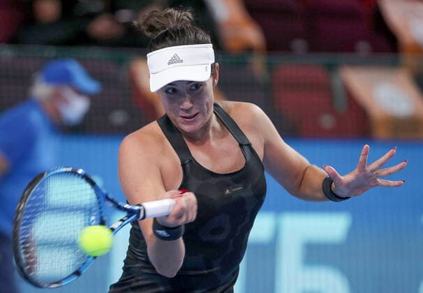 MOSCOW, RUSSIA - OCTOBER 20, 2021: Spain s Garbine Muguruza returns the ball in her women s singles Round of 16 tennis match against the Czech Republic s Tereza Martincova at the VTB Kremlin Cup 2021 at the Luzhniki Sports Palace. Mikhail Tereshchenko TASS  TS114DFD