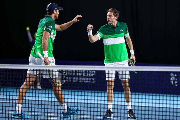 French Fabrice Martin and French Nicolas Mahut celebrates after winning a doubles men game between Austrian pair Marach-Oswald and French pair Mahut-Martin, a quarter finals game at the European Open Tennis ATP, Tennis Herren tournament, in Antwerp, Thursday 21 October 2021. DAVIDxPINTENS  x3119217x