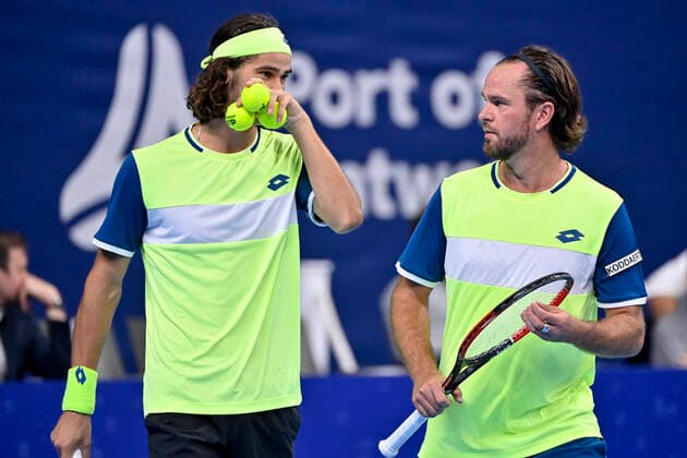 South African Lloyd Harris and Belgian Xavier Malisse pictured in action during a doubles men game between Serbian Dodig and Brazilian Melo and Belgian Malisse and South-African Harris, a quarter finals game at the European Open Tennis ATP, Tennis Herren tournament, in Antwerp, Thursday 21 October 2021. DAVIDxPINTENS  x3119683x