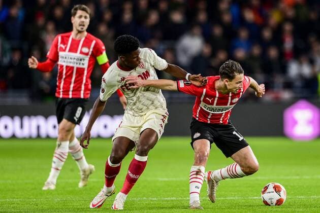 EINDHOVEN - (lr) Aurelien Tchouameni of AS Monaco, Olivier Boscagli of PSV Eindhoven during the UEFA Europa League match between PSV Eindhoven and AS Monaco at Phillips Stadium on October 21, 2021 in Eindhoven, Netherlands. ANP OLAF KRAAK UEFA Europa League 2021 2022 xVIxANPxSportx xxANPxIVx