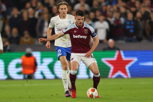 21st October 2021; London Stadium. London, England; Europa League football, West Ham United versus KRC Genk; Declan Rice of West Ham United under pressure from Kristian Thorstvedt of KRC Genk  ActionPlus12332357 ShaunxBrooks