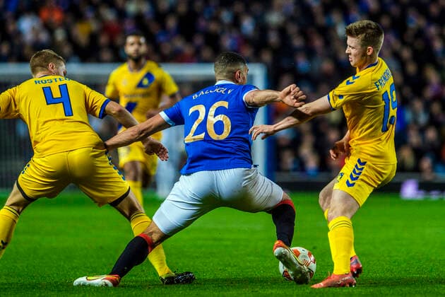 Rangers v Broendby IF, UEFA Europa League, Glasgow, Scotland Glasgow, Scotland. 21st, October 2021. Leon Balogun (26) of Rangers seen in between Morten Frendrup (19) and Sigurd Rosted (4) of Broendby IF during the UEFA Europa League match between Rangers and Broendby IF at Ibrox Stadium in Glasgow. Glasgow Scotland  Copyright: xGonzalesxPhoto RobertxHendelx