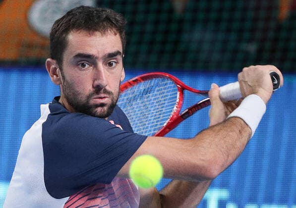 MOSCOW, RUSSIA - OCTOBER 22, 2021: Croatiaâ€™s Marin Cilic in action in his menâ€™s singles quarterfinal tennis match against Spain s Pedro Martinez at the VTB Kremlin Cup 2021 at Irina Viner-Usmanova Rhythmic gymnastics, Rhythmische Sportgymnastik, RSG Center. Mikhail Tereshchenko TASS  TS11539D