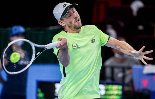 MOSCOW, RUSSIA - OCTOBER 22, 2021: Australia s John Millman in action in his singles quarterfinal tennis match against Russia s Karen Khachanov at the VTB Kremlin Cup 2021 at Irina Viner-Usmanova Rhythmic gymnastics, Rhythmische Sportgymnastik, RSG Center. Mikhail Tereshchenko TASS  TS11547C
