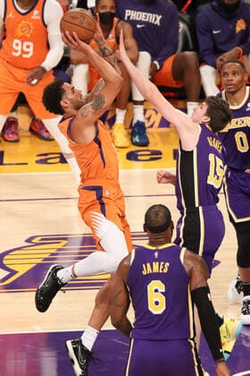 October 22, 2021, Los Angeles, California, USA: Suns Abdel Nader goes in for this shot under duress from Lakers defender Austin Reaves during the contest as the host Los Angeles Lakers fall to the visiting Phoenix Suns 105-115 on Friday, October 22, 2021 at The Staples Center in Los Angeles, California. PI Los Angeles USA - ZUMAp124 20211022_zaa_p124_021 Copyright: xBURTxHARRISx