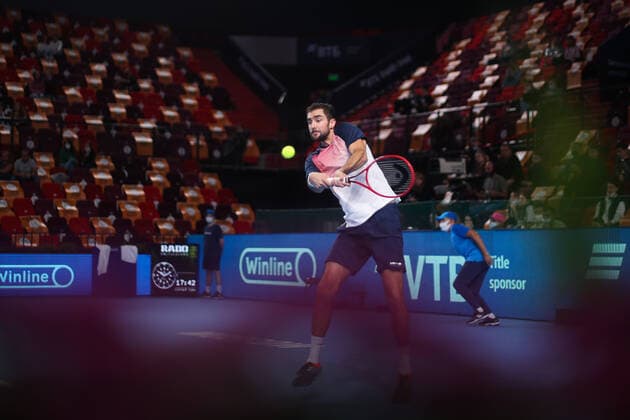 MOSCOW, RUSSIA - OCTOBER 23, 2021: Croatia s Marin Cilic returns the ball in his men s singles semifinal match against Lithuania s Ricardas Berankis at the VTB Kremlin Cup 2021 international tennis tournament at the Irina Viner-Usmanova Gymnastics Palace. Mikhail Tereshchenko TASS  TS115608