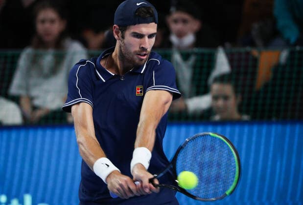 MOSCOW, RUSSIA - OCTOBER 23, 2021: Russia s Karen Khachanov returns the ball in his men s singles semifinal match against Russia s Aslan Karatsev at the VTB Kremlin Cup 2021 international tennis tournament at the Irina Viner-Usmanova Gymnastics Palace. Mikhail Tereshchenko TASS  TS11563A