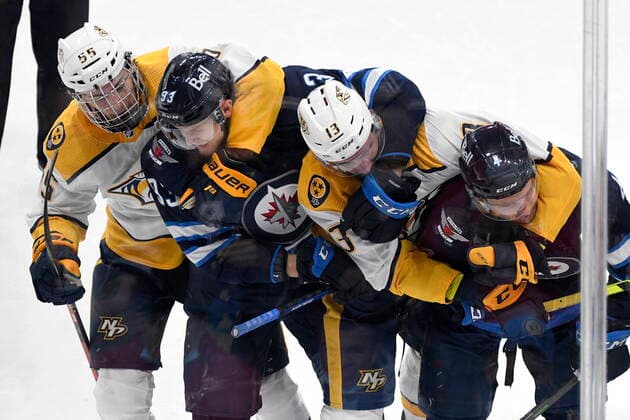 Sport Themen der Woche KW42 October 23, 2021, Winnipeg, Manitoba, Canada: Winnipeg Jets Kristian Vesalainen (93) and Neal Pionk (4) battle with Nashville Predators Philippe Myers (55) and Yakov Trenin (13) during the second period of NHL, Eishockey Herren, USA action in Winnipeg on Saturday, October 23, 2021. Winnipeg Jets vs Nashville Predators  - ZUMAc35_ 20211023_zaf_c35_135 Copyright: xFredxGreensladex