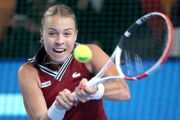 MOSCOW, RUSSIA - OCTOBER 24, 2021: Estonia s Anett Kontaveit returns the ball in her women s singles final match against Russia s Ekaterina Alexandrova at the VTB Kremlin Cup 2021 international tennis tournament at the Irina Viner-Usmanova Gymnastics Palace. Mikhail Tereshchenko TASS  TS115784