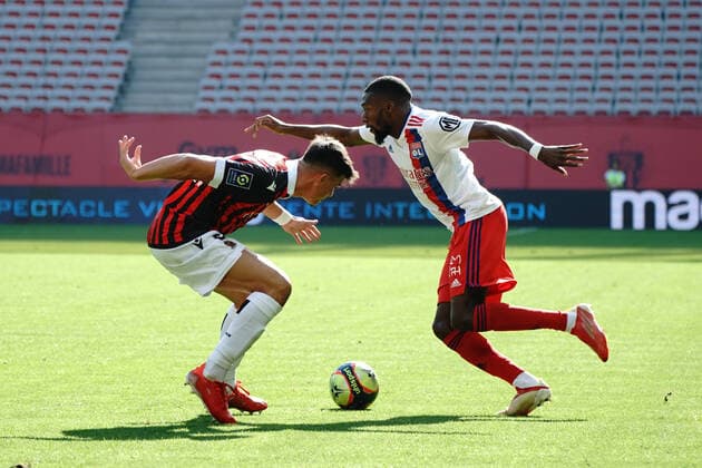 Karl Toko Ekambi (Lyon) - Flavius Daniluc (OGC Nice) FOOTBALL : OGC Nice vs Lyon - Ligue 1 Uber Eats - Nice - 24 10 2021 NorbertScanella Panoramic 