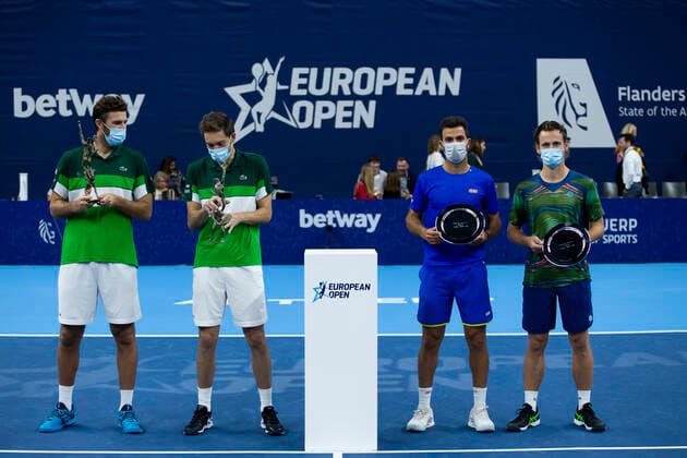 French Fabrice Martin, French Nicolas Mahut, Dutch Jean-Julien Rojer and Dutch Wesley Koolhof pictured after a doubles men game between Dutch pair Koolhof - Rojer and French Mahut - Martin, the finals of the European Open Tennis ATP, Tennis Herren tournament, in Antwerp, Sunday 24 October 2021. KRISTOFxVANxACCOM  x3122784x