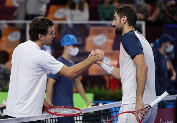 MOSCOW, RUSSIA - OCTOBER 24, 2021: Russia s Aslan Karatsev (L) and Croatia s Marin Cilic shake hands after their singles final match at the VTB Kremlin Cup 2021 international tennis tournament at the Irina Viner-Usmanova Gymnastics Palace. Mikhail Tereshchenko TASS  TS115886