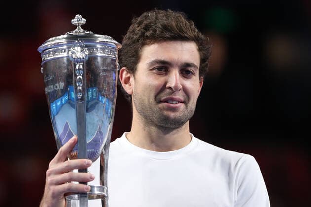 MOSCOW, RUSSIA - OCTOBER 24, 2021: Russia s Aslan Karatsev celebrates wining the first prize of the VTB Kremlin Cup 2021 international tennis tournament during the victory ceremony at the Irina Viner-Usmanova Gymnastics Palace. Mikhail Tereshchenko TASS  TS11589A