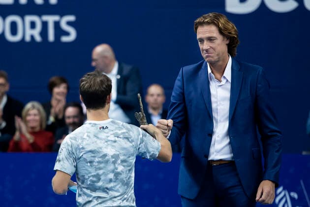 Argentina s Diego Schwartzman and former tennis player and tournament director Dick Norman pictured after a tennis match between Italian Sinner and Argentinian Schwartzman, the finals of the singles at the European Open Tennis ATP, Tennis Herren tournament, in Antwerp, Sunday 24 October 2021. KRISTOFxVANxACCOM  x3123501x