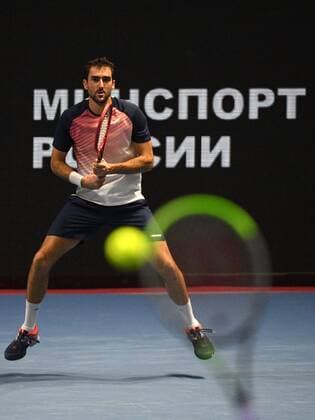 6683594 28.10.2021 Croatia s Marin Cilic watches the ball during the men s singles 2nd round match against Russia s Karen Khachanov at the St. Petersburg Open international tennis tournament at Sibur Arena, in St. Petersburg, Japan. Alexander Galperin Sputnik Russia Tennis St Petersburg Open  e779a0588004e892