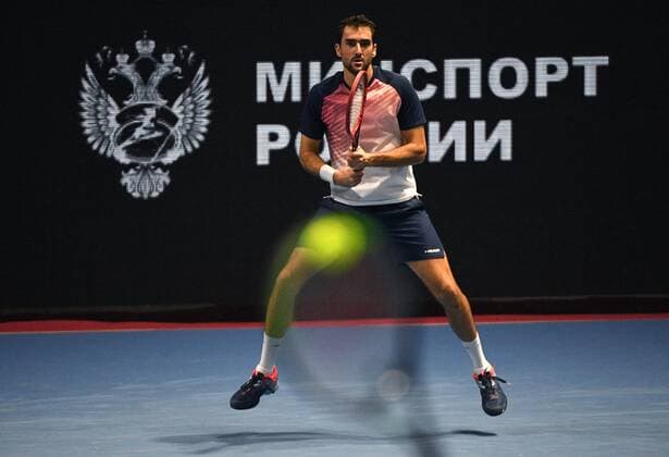 6683595 28.10.2021 Croatia s Marin Cilic watches the ball during the men s singles 2nd round match against Russia s Karen Khachanov at the St. Petersburg Open international tennis tournament at Sibur Arena, in St. Petersburg, Japan. Alexander Galperin Sputnik Russia Tennis St Petersburg Open  589379abdeac9a2e