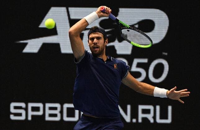 6683678 28.10.2021 Russia s Karen Khachanov returns the ball during the men s singles 2nd round match against Croatia s Marin Cilic at the St. Petersburg Open international tennis tournament at Sibur Arena, in St. Petersburg, Russia. Alexander Galperin Sputnik Russia Tennis St Petersburg Open  82d5c02e55abf7a2
