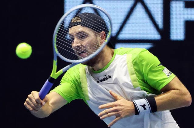 ST PETERSBURG, RUSSIA - OCTOBER 29, 2021: Germany s Jan-Lennard Struff returns the ball in his men s singles quarterfinal match against Canada s Denis Shapovalov at the St Petersburg Open 2021 international tennis tournament at Sibur Arena. Peter Kovalev TASS  TS116367