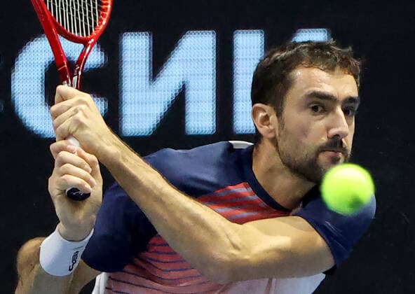 ST PETERSBURG, RUSSIA - OCTOBER 31, 2021: Croatia s Marin Cilic returns the ball in his men s singles final match against the USA s Taylor Fritz at the St Petersburg Open 2021 international tennis tournament at Sibur Arena. Peter Kovalev TASS  TS116683