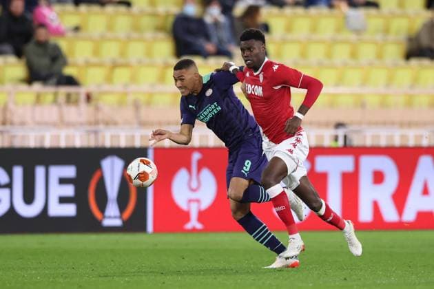 Monaco, Monaco, 4th November 2021. Benoit Badiashile of AS Monaco tussles with Carlos Vinicius of PSV Eindhoven during the UEFA Europa League match at Stade Louis II, Monaco. Picture credit should read: Jonathan Moscrop Sportimage EDITORIAL USE ONLY. No use with unauthorised audio, video, data, fixture lists, club league logos or live services. Online in-match use limited to 120 images, no video emulation. No use in betting, games or single club league player publications. SPI-1284-0015