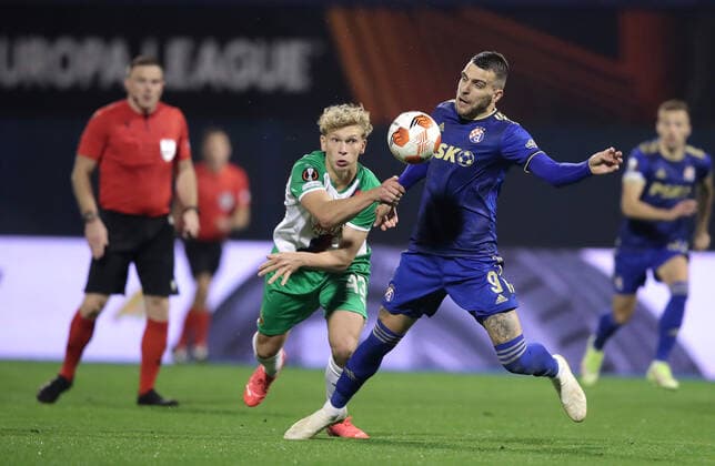 Dinamo Zagreb v Rapid Wien: Group H - UEFA Europa League Komnen Andric of Dinamo Zagreb in action against Thorsten Schick of Rapid during the UEFA Europa League group H match between Dinamo Zagreb and Rapid Wien at Maksimir Stadium on November 4, 2021 in Zagreb, Croatia. LukaxStanzl PIXSELL