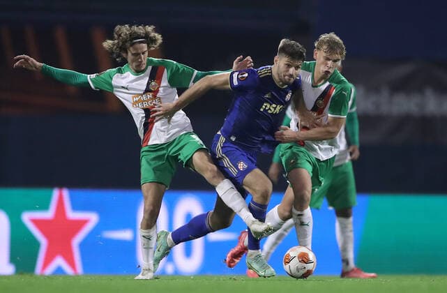 Dinamo Zagreb v Rapid Wien: Group H - UEFA Europa League Bruno Petkovic of Dinamo Zagreb in action against Leopold Querfeld of Rapid during the UEFA Europa League group H match between Dinamo Zagreb and Rapid Wien at Maksimir Stadium on November 4, 2021 in Zagreb, Croatia. IgorxKralj PIXSELL