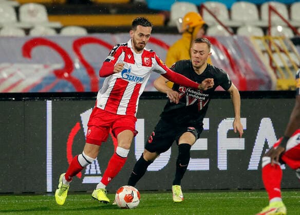(211105) -- BELGRADE, Nov. 5, 2021 -- Red Star s Mirko Ivanic (L) vies with Midtjylland s Joel Andersson during the UEFA Europa League Group F football match between Crvena Zvezda and Midtjylland in Belgrade, Serbia on Nov. 4, 2021. (Photo by Xinhua) (SP)SERBIA-BELGRADE-FOOTBALL-UEFA-RED STAR VS MIDTJYLLAND PredragxMilosavljevic 