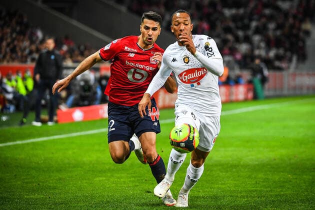 Zeki CELIK of Lille and Enzo EBOSSE of Angers FOOTBALL : Lille OSC vs Angers SCO - Ligue 1 Uber Eats - 06 11 2021 MatthieuMirville Panoramic 