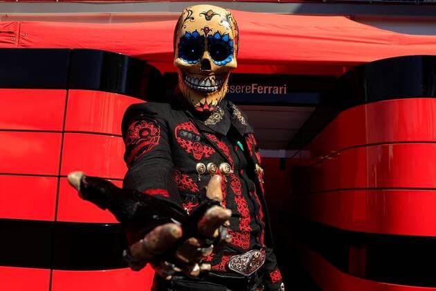 A person in a mariachi costume and a Catrina mask, alluding to the Day of the Dead, poses in front of the Ferrari shield before the start of the third practice for the Formula One Grand Prix of Mexico, that takes place at the Hermanos Rodriguez Autodrome, in Mexico City, Mexico, 06 November 2021. Formula One Grand Prix of Mexico !ACHTUNG: NUR REDAKTIONELLE NUTZUNG!  Copyright: xCarlosxRamírezx AMDEP1902 20211106-f217e7c414233f4063b4c8281a13a8a503c8ba23