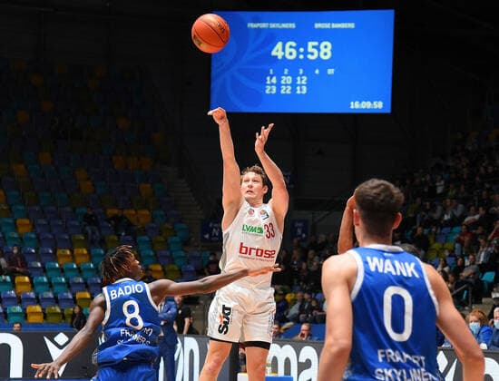 07.11.2021, xhbx, Basketball BBL Bundesliga, Frankfurt Skyliners - Brose Bamberg emspor, v.l. Brancou Badio (Fraport Skyliners Frankfurt), Patrick Heckmann (Brose Baskets Bamberg), Lukas Wank (Fraport Skyliners Frankfurt) (DFL DFB REGULATIONS PROHIBIT ANY USE OF PHOTOGRAPHS as IMAGE SEQUENCES and or QUASI-VIDEO) Frankfurt am Main
