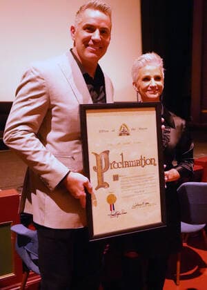 Kurt and Brenda Warner are presented a proclamation from the City of St. Louis during a special screening of the new movie featuring Warner, American Underdog, at the Tivoli Theater in University City, Missouri on Monday, November 8, 2021. The movie depicts Warner from a supermarket clerk to a Super Bowl Champion with the St. Louis Rams.  SLP2021110818 BILLxGREENBLATT