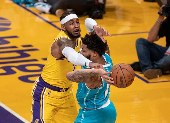 November 8, 2021, Los Angeles, California, USA: Camelo Anthony 7 of the Los Angeles Lakers blocks a pass by Miles Bridges 0 of the Charlotte Hornets during their regular season NBA, Basketball Herren, USA game on Monday November 8, 2021 at the Staples Center in Los Angeles, California. Lakers defeat Hornets, 126-123. PI Los Angeles USA - ZUMAp124 20211108_zaa_p124_032 Copyright: xJAVIERxROJASx