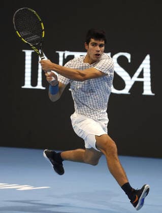 November 9, 2021, MILAN, ITALY: Carlos Alcaraz of Spain returns the ball during the match against Holger Virtus Rune of Denmark on the first day of the Next Gen ATP, Tennis Herren Finals in Milan, Italy, 09 November 2021. The Next Gen Atp Finals runs from 09 November through 13 November.ANSA MATTEO BAZZI MILAN ITALY - ZUMAa110 20211109_zaf_a110_021 Copyright: xMatteoxBazzix