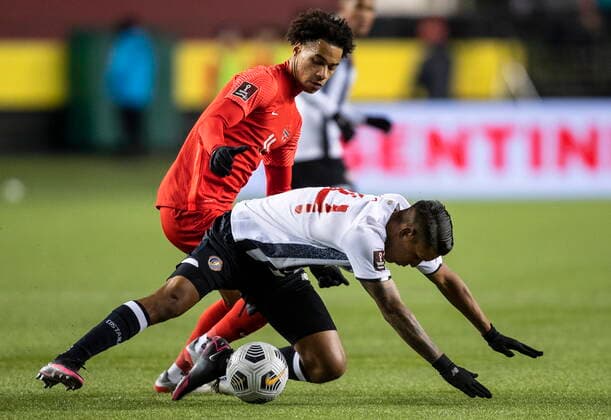 November 12, 2021, EDMONTON, AB, CANADA: Team Canada s Kamal Miller (4) and Costa Rica s Orlando Moises Galo Calderon (14) vie for the ball during first half World Cup qualifier soccer action in Edmonton on Friday, November 12, 2021. Kamal Miller Orlando Moises Galo Calderon  - ZUMAc35_ 20211112_zaf_c35_060 Copyright: xJasonxFransonx