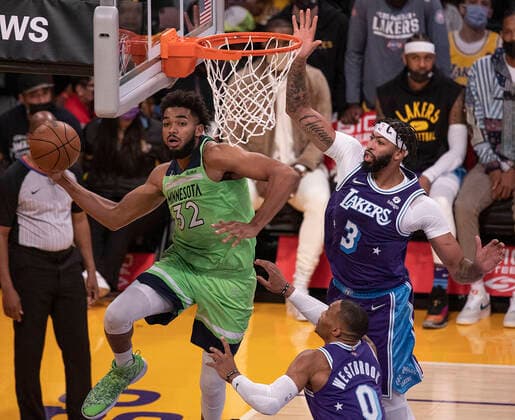 November 12, 2021, Los Angeles, California, USA: Karl-Anthony Towns 32 of the Minnesota Timberwolves saves a ball as Anthony Davis 3 of the Los Angeles Lakers defends during their regular season NBA, Basketball Herren, USA game on Friday November 12, 2021 at the Staples Center in Los Angeles, California. Lakers lose to Timberwolves, 83-107. PI Los Angeles USA - ZUMAp124 20211112_zaa_p124_014 Copyright: xJAVIERxROJASx