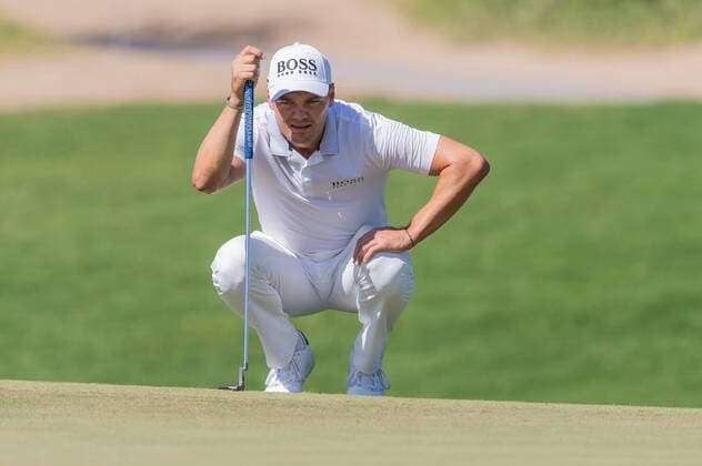 Martin Kaymer of Germany lines ups putt on the green at the second hole during the AVIV Dubai Championship day 4 at Jumeirah Golf Estates, Dubai, UAE on 14 November 2021. Copyright: xGrantxWinterx 29980193