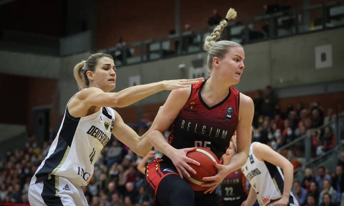 Germany s Sonja Greinacher and Belgium s Becky Massey fight for the ball during a basketball game between Belgian national basket team the Belgian Cats and Germany, Sunday 14 November 2021 in Kortrijk, a qualifier for the FIBA Women s EuroBasket 2023 tournament. VIRGINIExLEFOUR  x3136133x