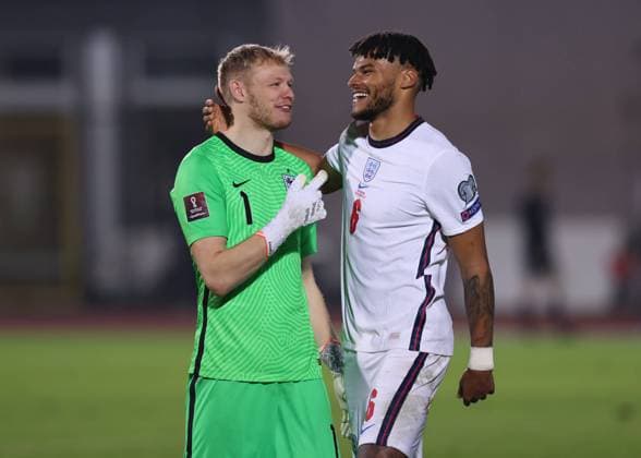 Fußball, WM Quali, San Marino - England Serravalle, Italy, 15th November 2021. Aaron Ramsdale and Tyrone Mings of England pictured following the final whistle during the FIFA World Cup, WM, Weltmeisterschaft, Fussball 2022 - European Qualifying match at San Marino Stadium, Serravalle. Picture credit should read: Jonathan Moscrop Sportimage EDITORIAL USE ONLY. No use with unauthorised audio, video, data, fixture lists, club league logos or live services. Online in-match use limited to 120 images, no video emulation. No use in betting, games or single club league player publications. SPI-1312-0050
