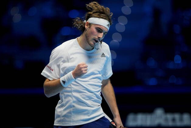 Mandatory Credit: Photo by Ella Ling Shutterstock (12603333cx) Stefanos Tsitsipas of Greece celebrates Nitto ATP, Tennis Herren World Tour Finals, Day 2, Tennis, Pala Alpitour, Turin, Italy - 15 Nov 2021 Nitto ATP World Tour Finals, Day 2, Tennis, Pala Alpitour, Turin, Italy - 15 Nov 2021  Copyright: xEllaxLing Shutterstockx 12603333cx