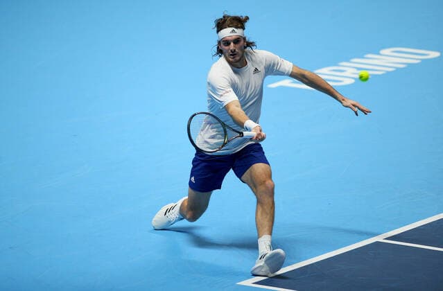 Mandatory Credit: Photo by Ella Ling Shutterstock (12603333dl) Stefanos Tsitsipas of Greece in action Nitto ATP, Tennis Herren World Tour Finals, Day 2, Tennis, Pala Alpitour, Turin, Italy - 15 Nov 2021 Nitto ATP World Tour Finals, Day 2, Tennis, Pala Alpitour, Turin, Italy - 15 Nov 2021  Copyright: xEllaxLing Shutterstockx 12603333dl