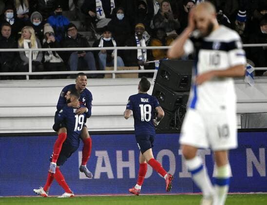 France s Karim Benzema (19), Kylian Mbappe and Lucas Digne celebrate the 0-1 goal by Benzema during the FIFA World Cup, WM, Weltmeisterschaft, Fussball Qatar 2022 Group D qualification match Finland vs France at the Helsinki Olympic Stadium in Helsinki, Finland on Tuesday, 16th Nov., 2021. Finland s Teemu Pukki in front. Helsinki Finland LKFTJK20211116230629KIFY  Copyright: xMarkkuxUlanderx