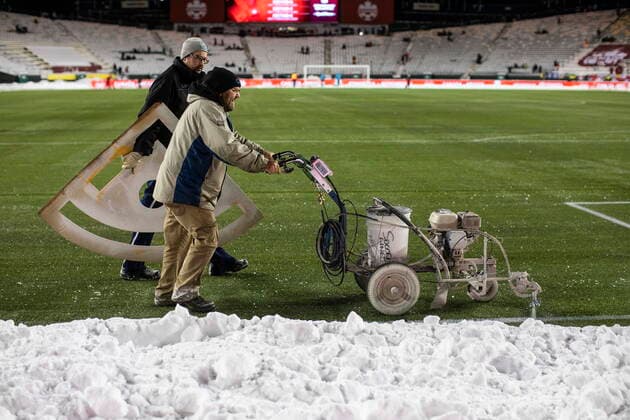 November 16, 2021, EDMONTON, ab, Canada: Crews clean snow off the field before a World Cup qualifying soccer match between Canada and Mexico, in Edmonton, Tuesday, Nov. 16, 2021. Canada News - November 16, 2021  - ZUMAc35_ 20211116_zaf_c35_109 Copyright: xJasonxFransonx