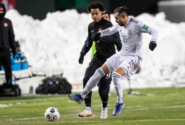 November 16, 2021, EDMONTON, ab, Canada: Canada s Tajon Buchanan (11) and Mexico s Hector Miguel Herrera Lopez (16) via for the ball during World Cup Qualifiers in Edmonton, Tuesday, Nov. 16, 2021. Tajon Buchannan Hector Miguel Herrera Lopez  - ZUMAc35_ 20211116_zaf_c35_175 Copyright: xJasonxFransonx