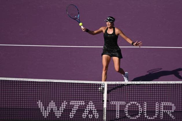 (211117) -- GUADALAJARA, Nov. 17, 2021 -- Spain s Garbine Muguruza hits a return during the women s singles semifinal against her compatriot Paula Badosa at the AKRON WTA, Tennis Damen Finals in Guadalajara, Mexico, Nov. 16, 2021. (Photo by Regina Cortina Xinhua) (SP)MEXICO-GUADALAJARA-TENNIS-WTA FINALS-SINGLES XinxYuewei 