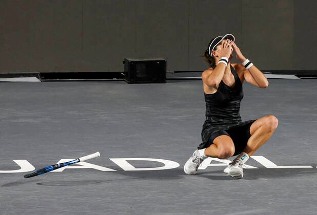 (211118) -- GUADALAJARA, Nov. 18, 2021 -- Spain s Garbine Muguruza celebrates after winning the women s singles final between Spain s Garbine Muguruza and Estonia s Anett Kontaveit at the AKRON WTA, Tennis Damen Finals in Guadalajara, Mexico, on Nov. 17, 2021. (Photo by Jorge Reyes Xinhua) (SP)MEXICO-GUADALAJARA-TENNIS-WTA FINALS-SINGLES XinxYuewei 