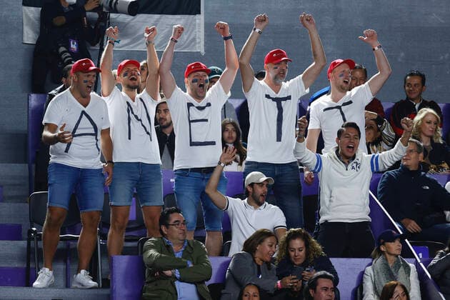 (211118) -- GUADALAJARA, Nov. 18, 2021 -- Supporters cheer for Estonia s Anett Kontaveit during the women s singles final between Spain s Garbine Muguruza and Estonia s Anett Kontaveit at the AKRON WTA, Tennis Damen Finals in Guadalajara, Mexico, on Nov. 17, 2021. (Photo by Jorge Reyes Xinhua) (SP)MEXICO-GUADALAJARA-TENNIS-WTA FINALS-SINGLES XinxYuewei 