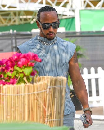 (211119) -- DOHA, Nov. 19, 2021 -- Mercedes-AMG Petronas driver Lewis Hamilton of Britain arrives at the Losail International Circuit ahead of the Qatar Formula One Grand Prix in Doha, Qatar, Nov. 18, 2021. (Photo by Nikku Xinhua) (SP)QATAR-DOHA-F1-LOSAIL INTERNATIONAL CIRCUIT yangyuanyong 
