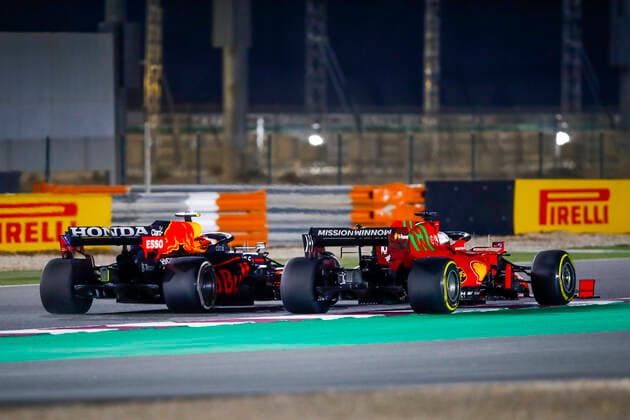 11 PEREZ Sergio (mex), Red Bull Racing Honda RB16B, 16 LECLERC Charles (mco), Scuderia Ferrari SF21, action during the Formula 1 Ooredoo Qatar Grand Prix 2021, 20th round of the 2021 FIA Formula One World Championship, WM, Weltmeisterschaft from November 19 to 21, 2021 on the Losail International Circuit, in Lusail, Qatar - F1 - QATAR GRAND PRIX 2021 - RACE DPPI Panoramic 00121042__B2_4666.JPG_